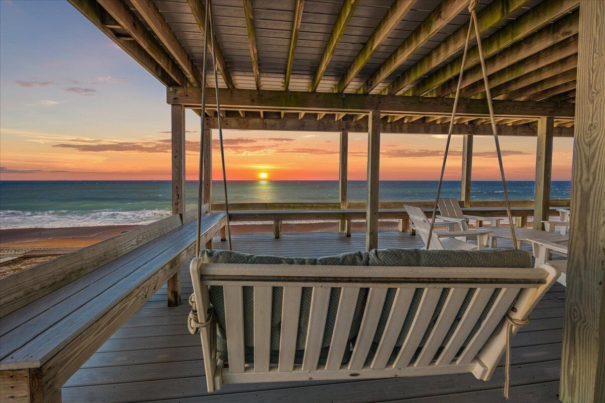 Enjoy a sunrise from the deck swing