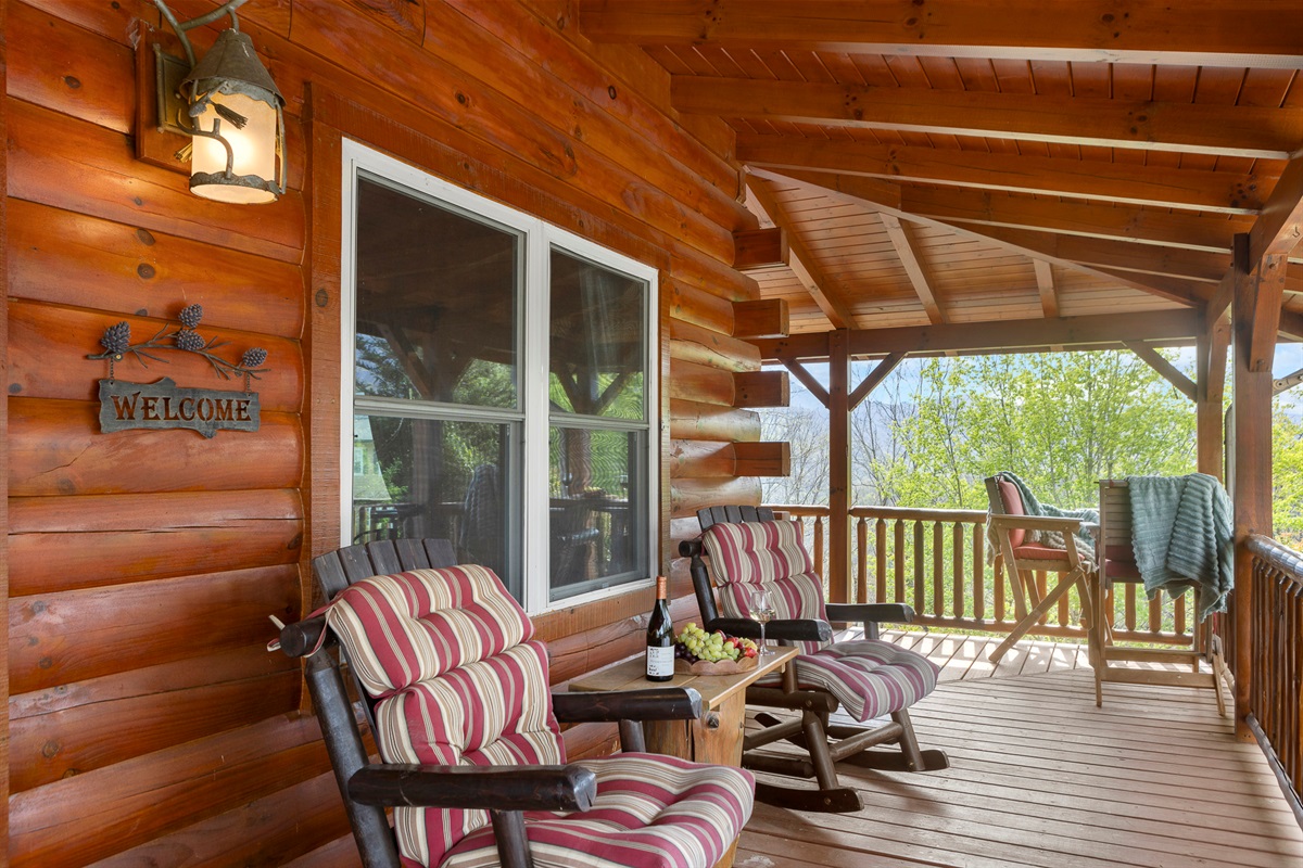 Porch Retreat: Sip wine on the spacious porch, surrounded by nature’s beauty and fresh mountain air!