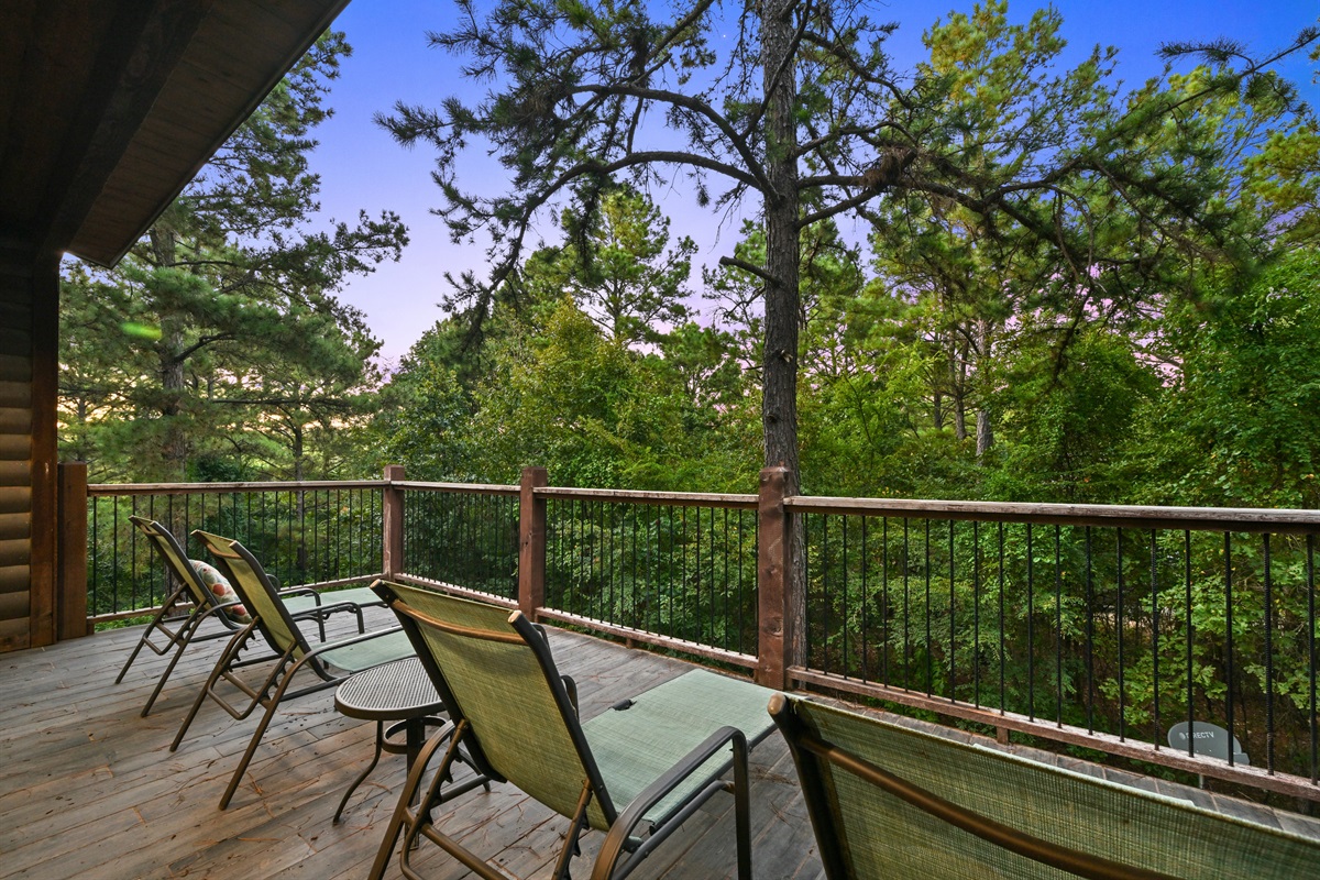 Lounge in the fresh air on the upper deck, where comfortable chairs and treetop views invite you to linger.