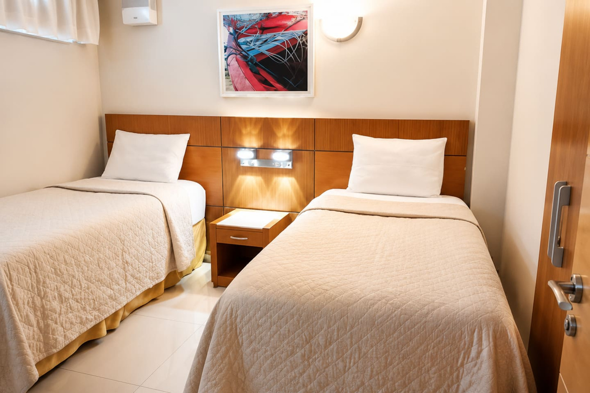 Bedroom 2, features two single beds. 