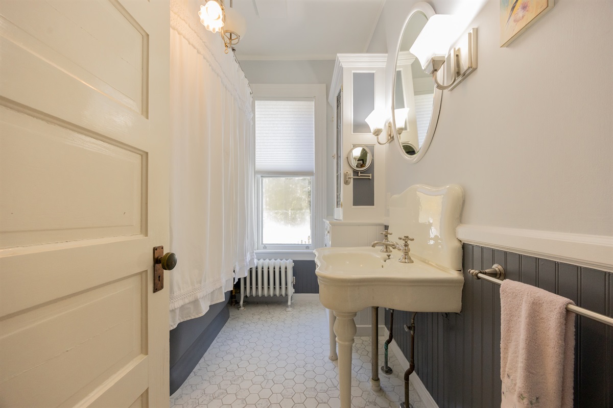 Relax in the bathtub of our second bathroom.