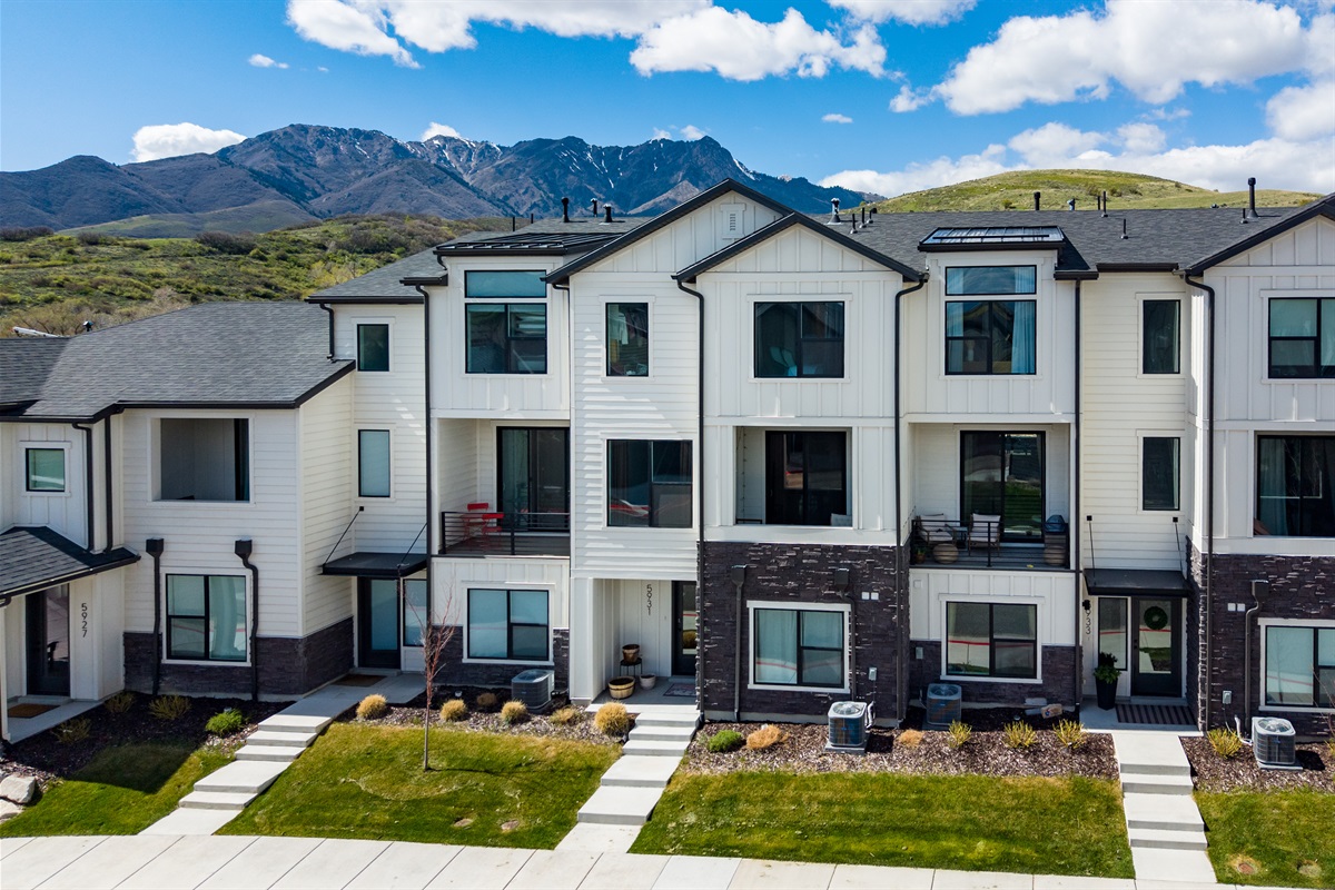 Modern townhome exteriors with upscale finishes.