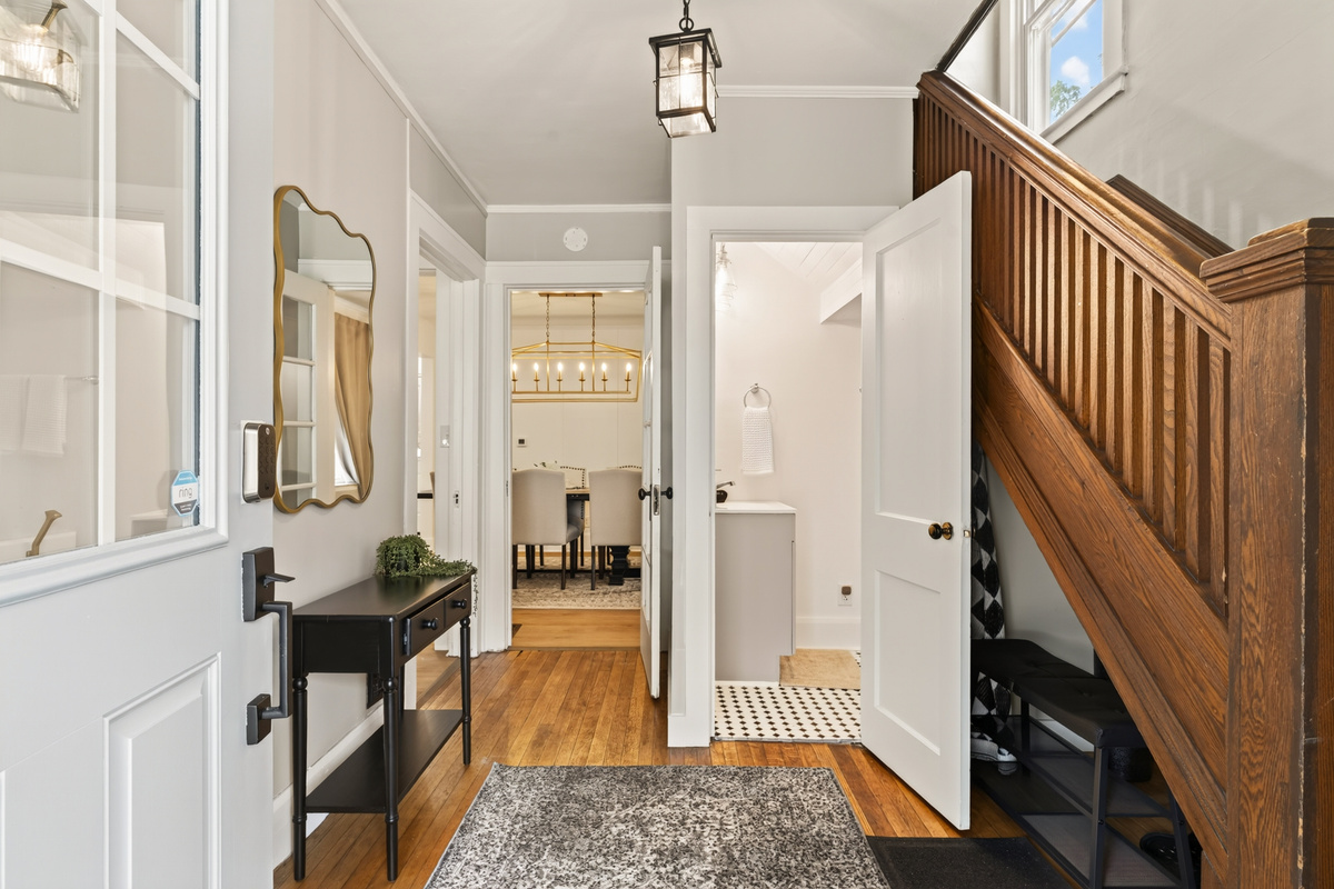 Hallway beside the wooden staircase