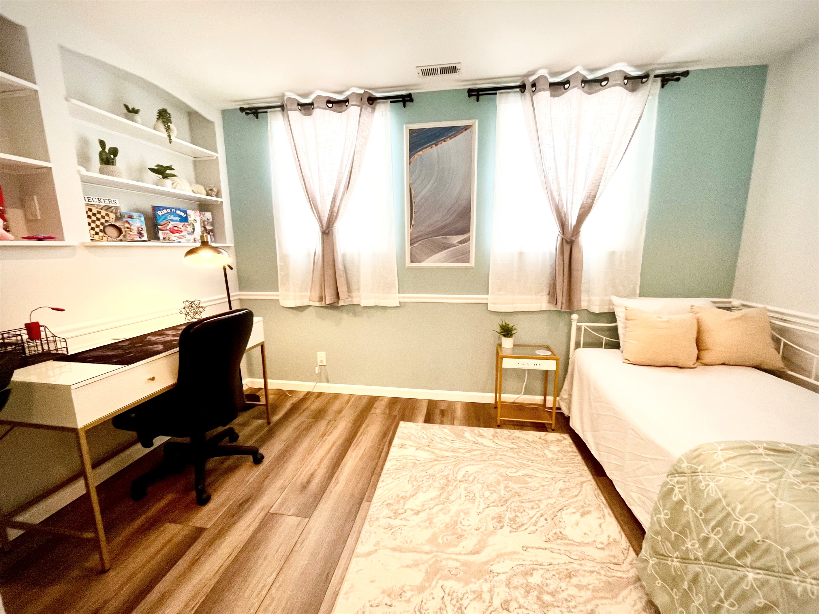 Lower level Bedroom/ office space with twin trundle bed