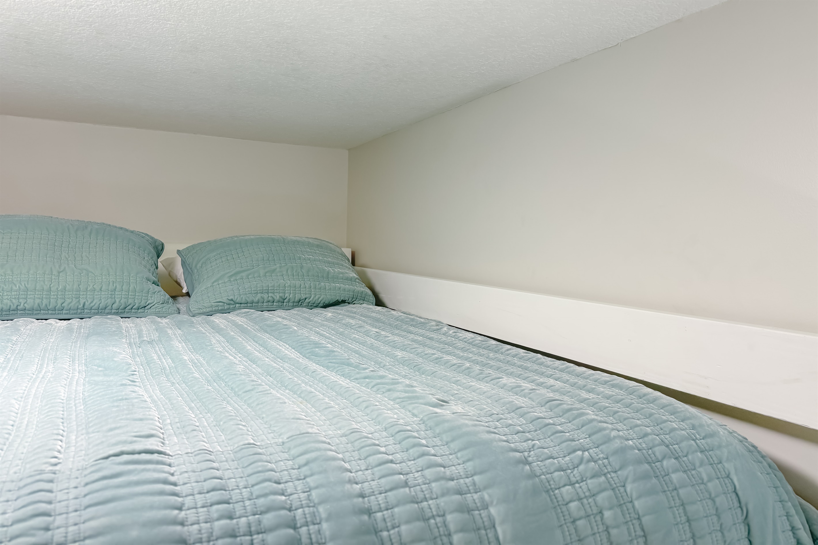 Tucked away for privacy, this charming bunk offers a fun and comfortable spot for the kids (or extra guests!) to rest after a day of adventure.