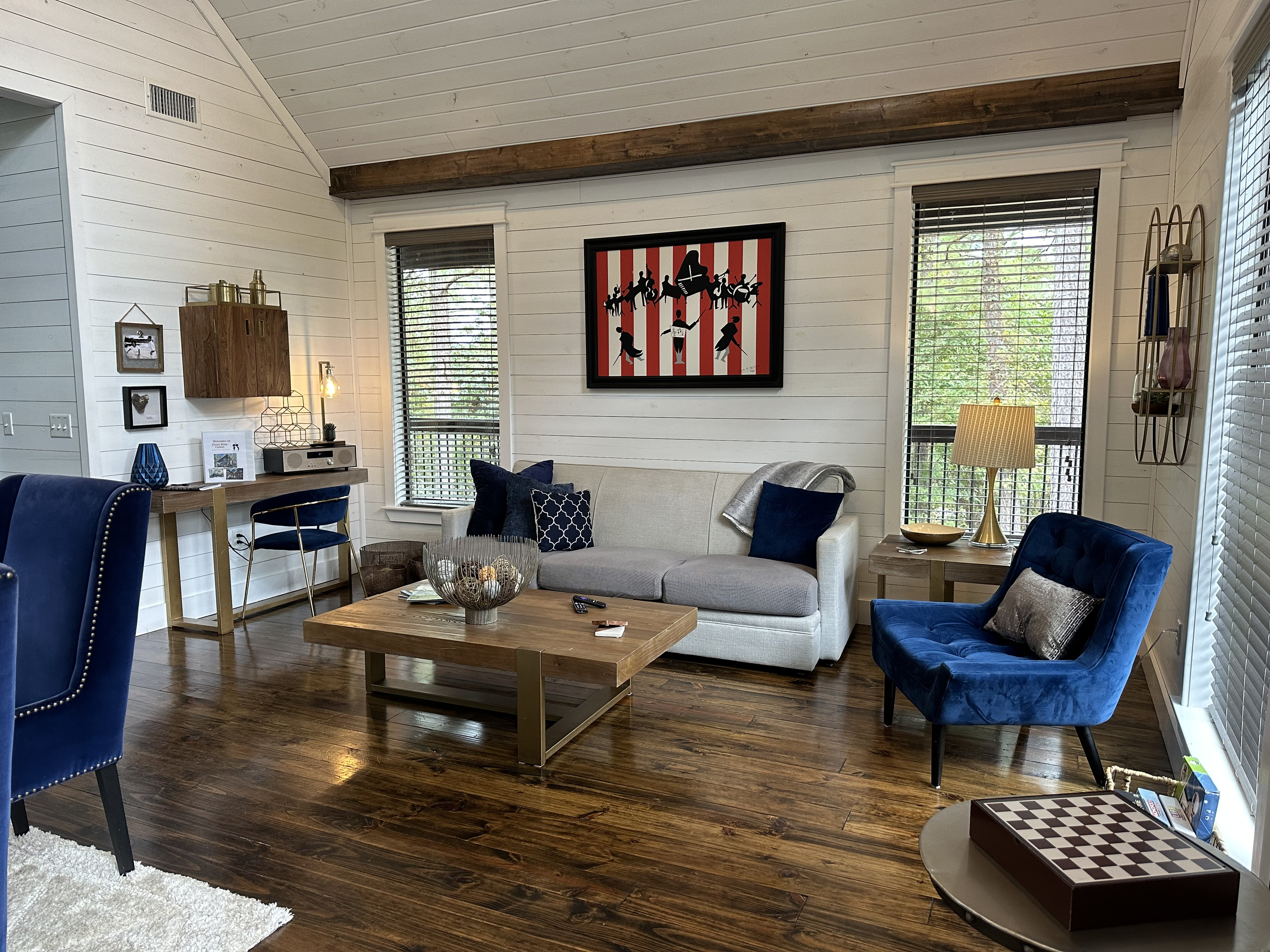 A view of the dining and living room areas at First Kiss - cozy, comfortable and exceptionally luxurious for your romantic couples getaway in this high end suite!