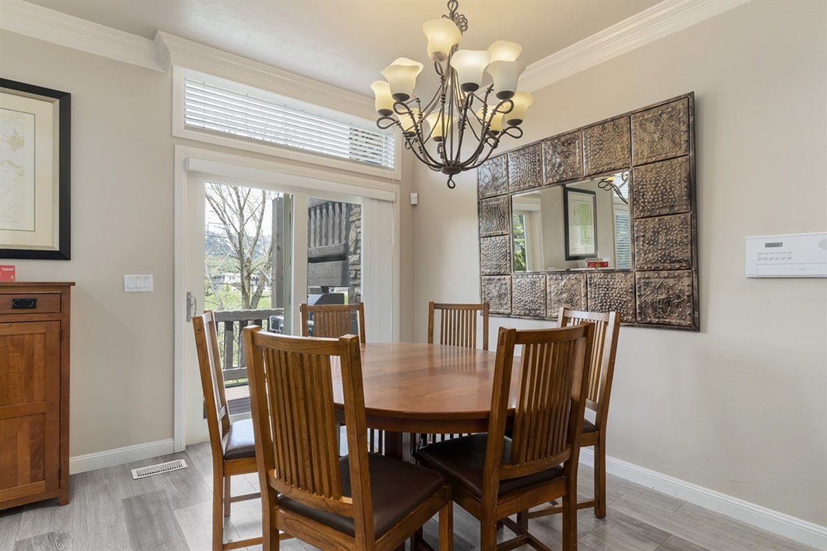 Inviting dining area with seating for group meals and natural light.