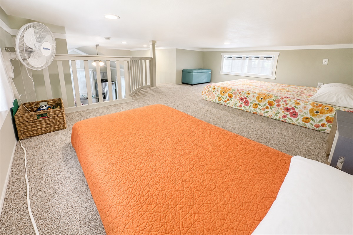 Loft open to kitchen & living below
NOTE: 1 twin + 1 queen bed