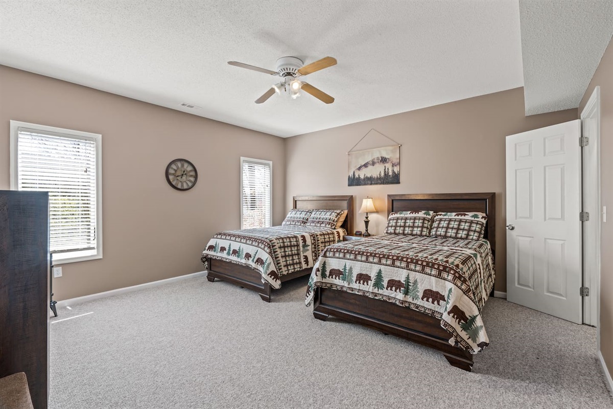 Lower level bedroom with 2 full beds, for that little bit of separation for second family