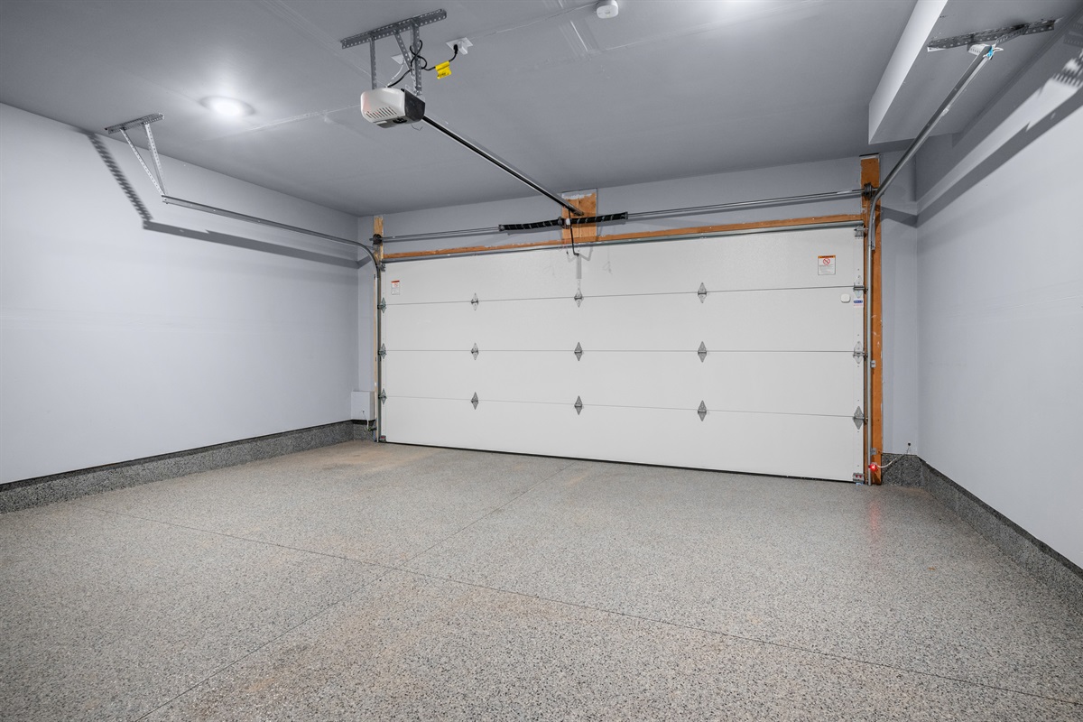 Two-car garage with ski storage possibilities.