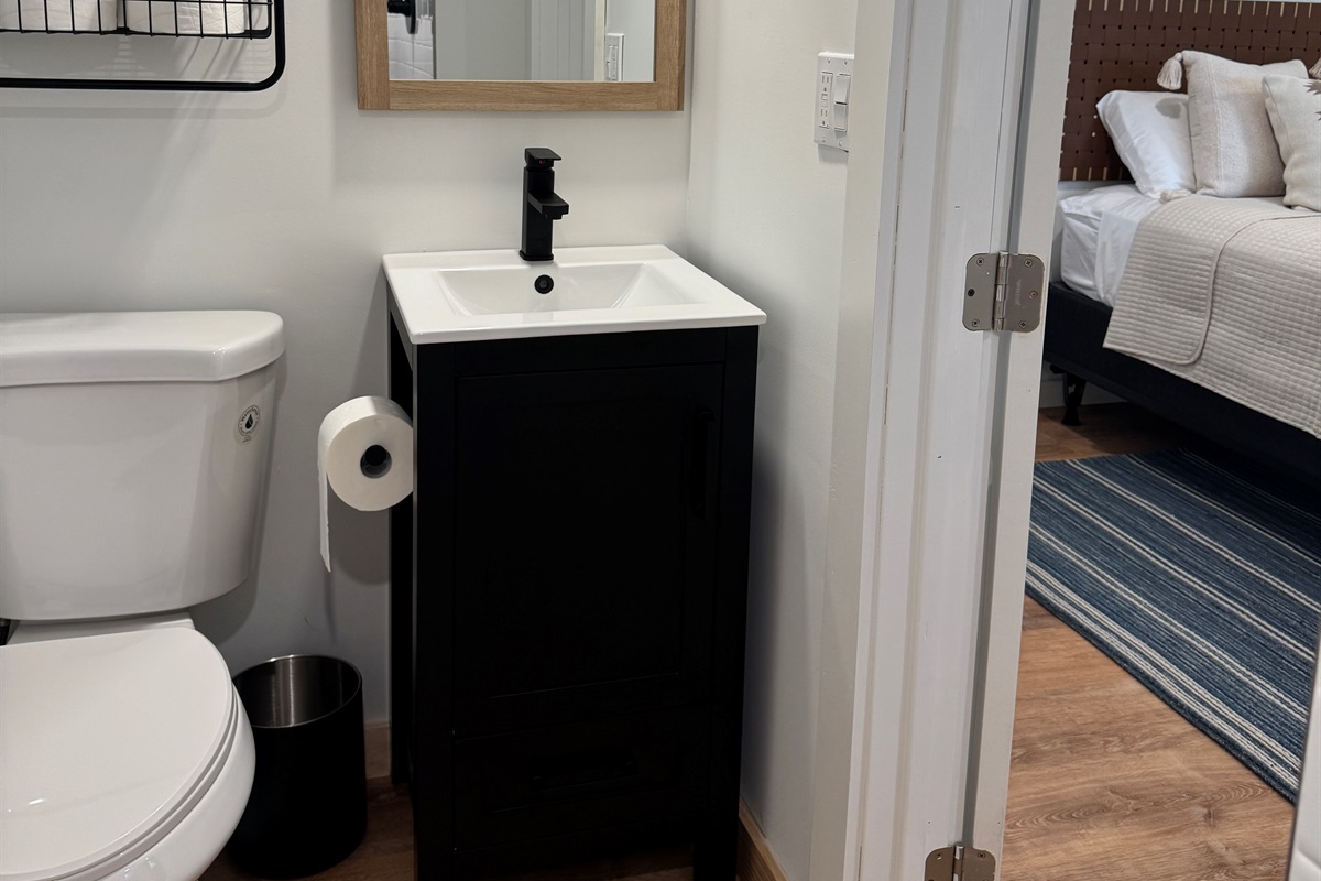 En-suite bath with shower