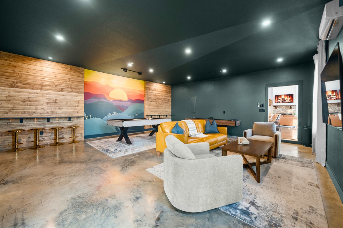 Between the lounge seating and gaming space, there&rsquo;s something for everyone to enjoy in this fun and inviting retreat.