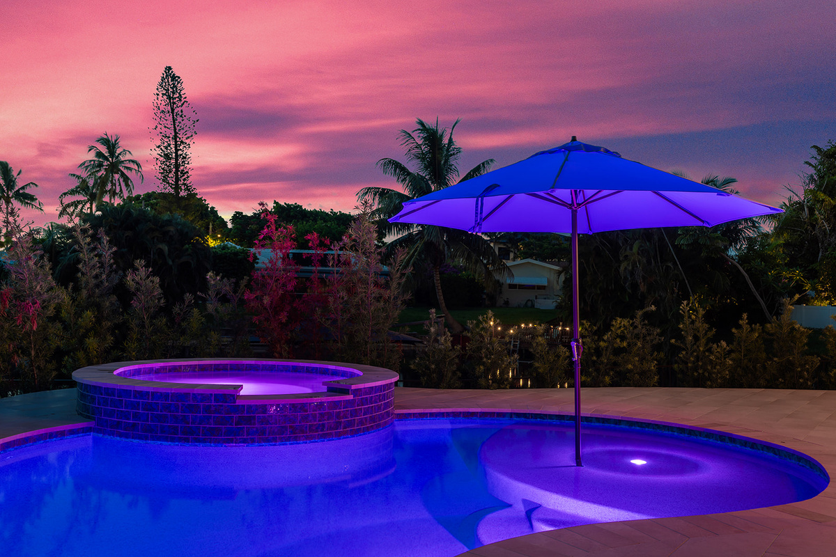 End the day with breathtaking sunsets and glowing pool lights that transform the backyard into a private evening oasis.