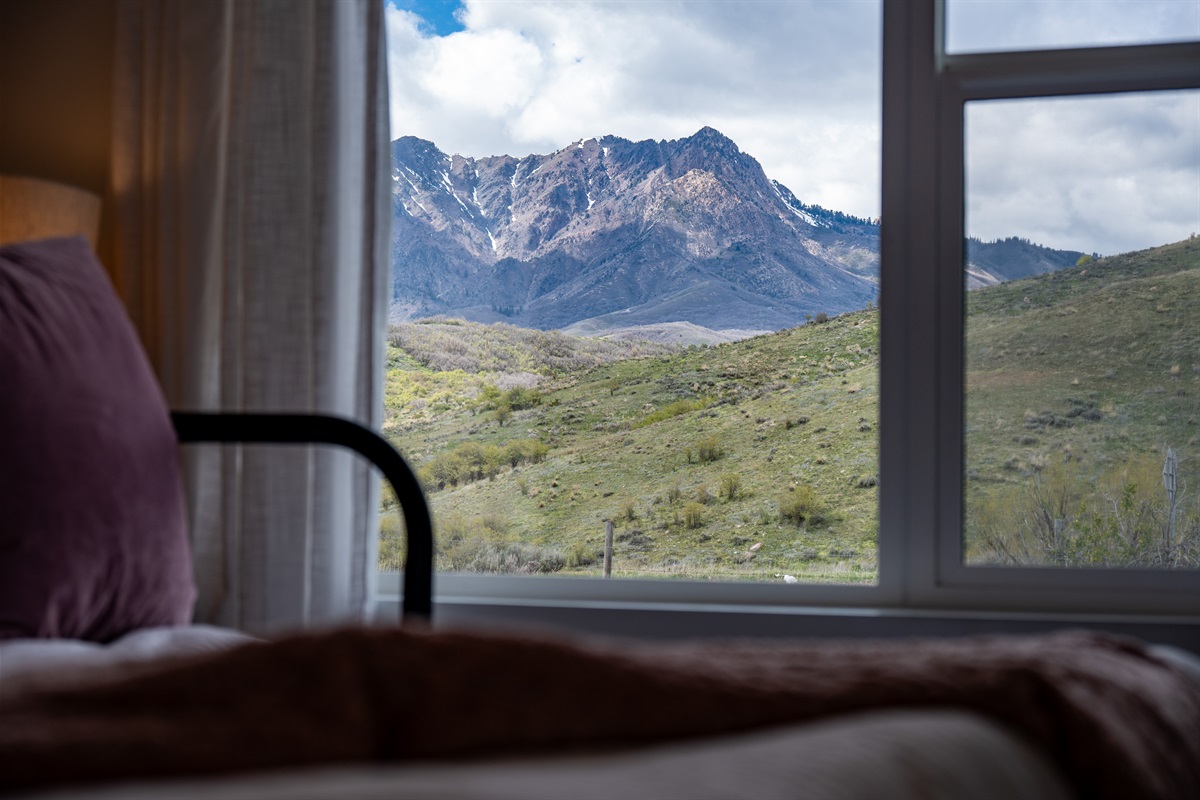 Wake up to breathtaking mountain views right from your bed.