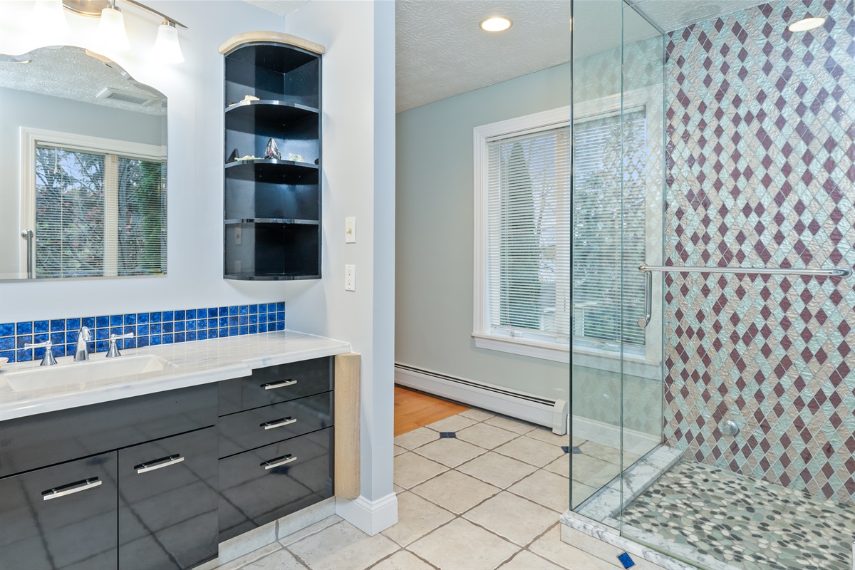 Full master bathroom with walk in shower