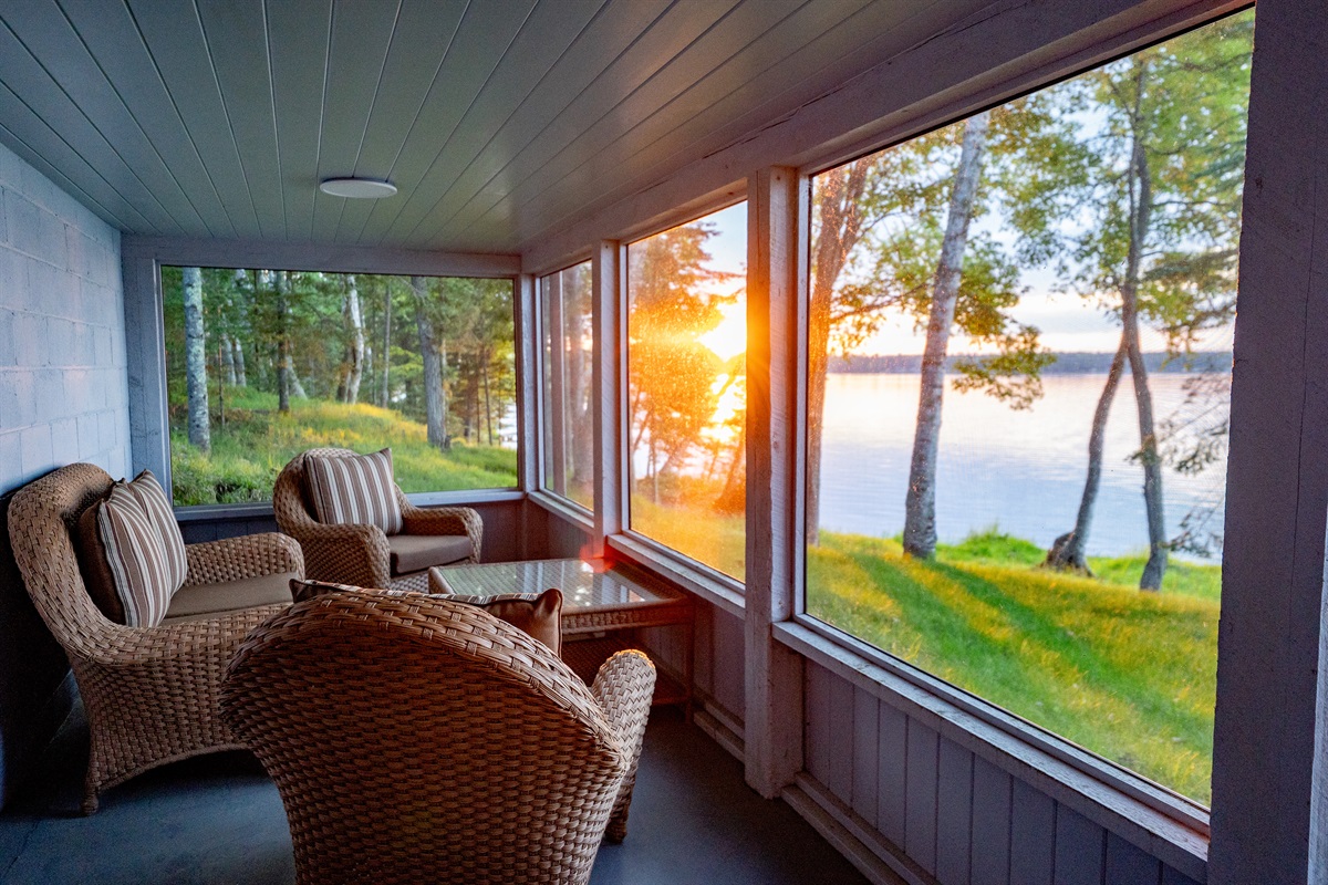 Relax with a cup of coffee or 5 o'clock cocktails on this screened in porch