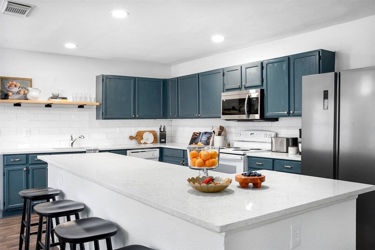 Prepare your favorite meals in the spacious, fully equipped kitchen.