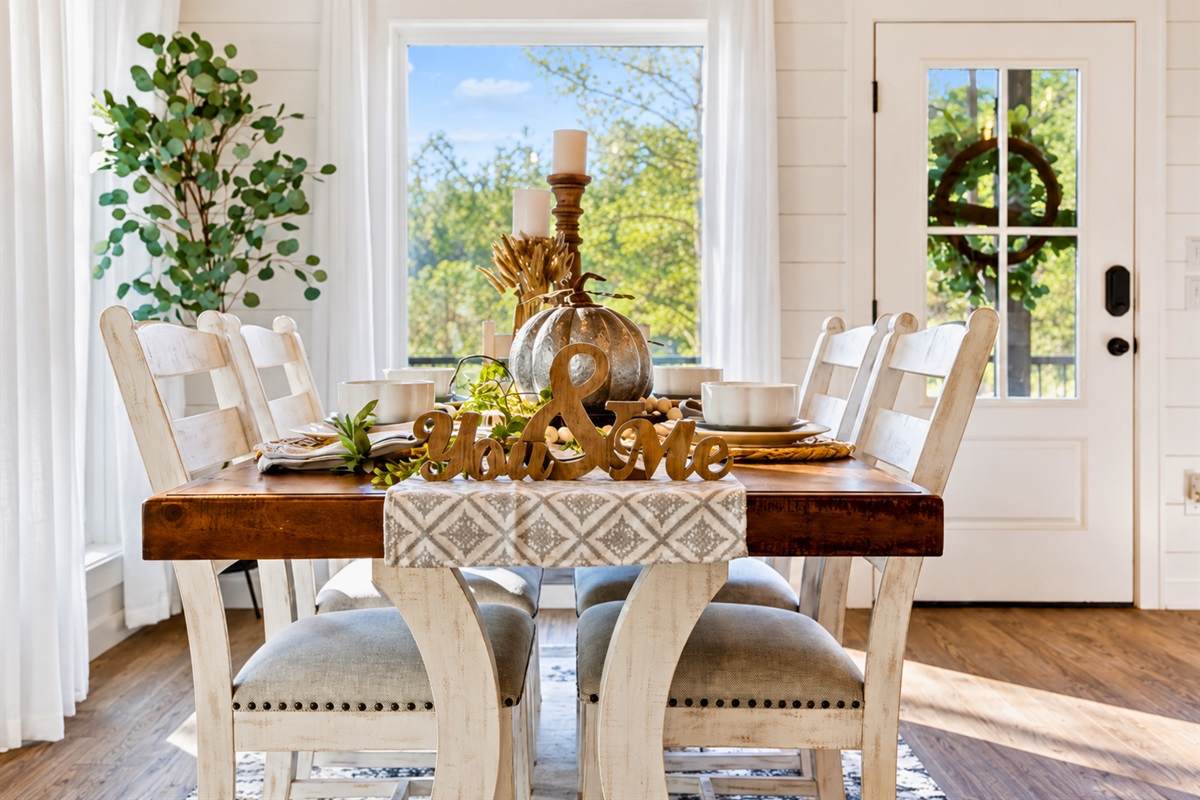 Enjoy quiet breakfasts, late-night conversations, and cozy dinners together in this inviting dining area designed for two.
