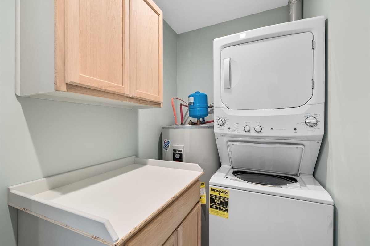 Stackable washer and dryer of Unit B.