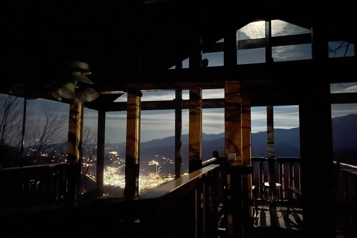 Here is your view of the Gatlinburg city lights from the king bed at night