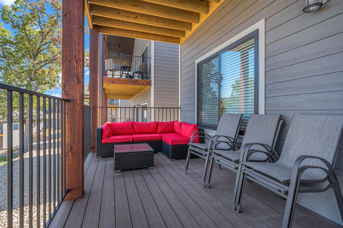 Lower deck with seating and hot tub