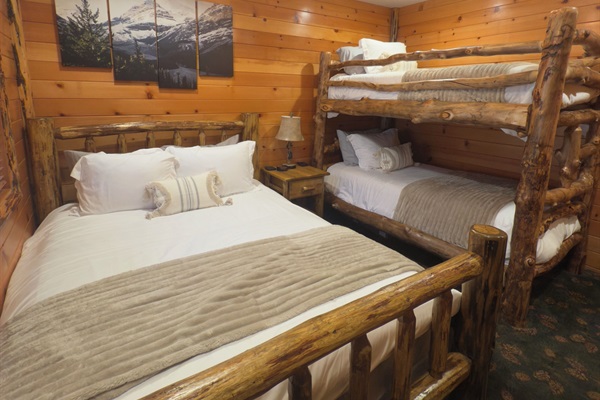 Guest Bedroom with queen size bed and twin bunk bed