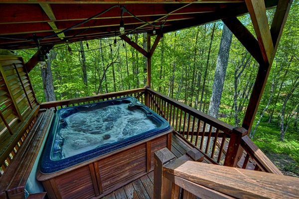 Hot tub with outdoor lighting