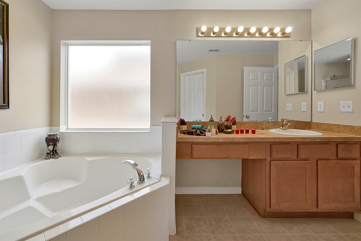 Sink into the deep soaking tub for a long, quiet soak—the ultimate way to unwind and recharge during your stay