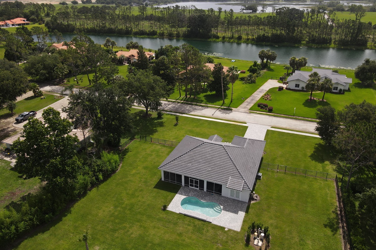 Drone view from backyard and Lake Denise (private ski lake).