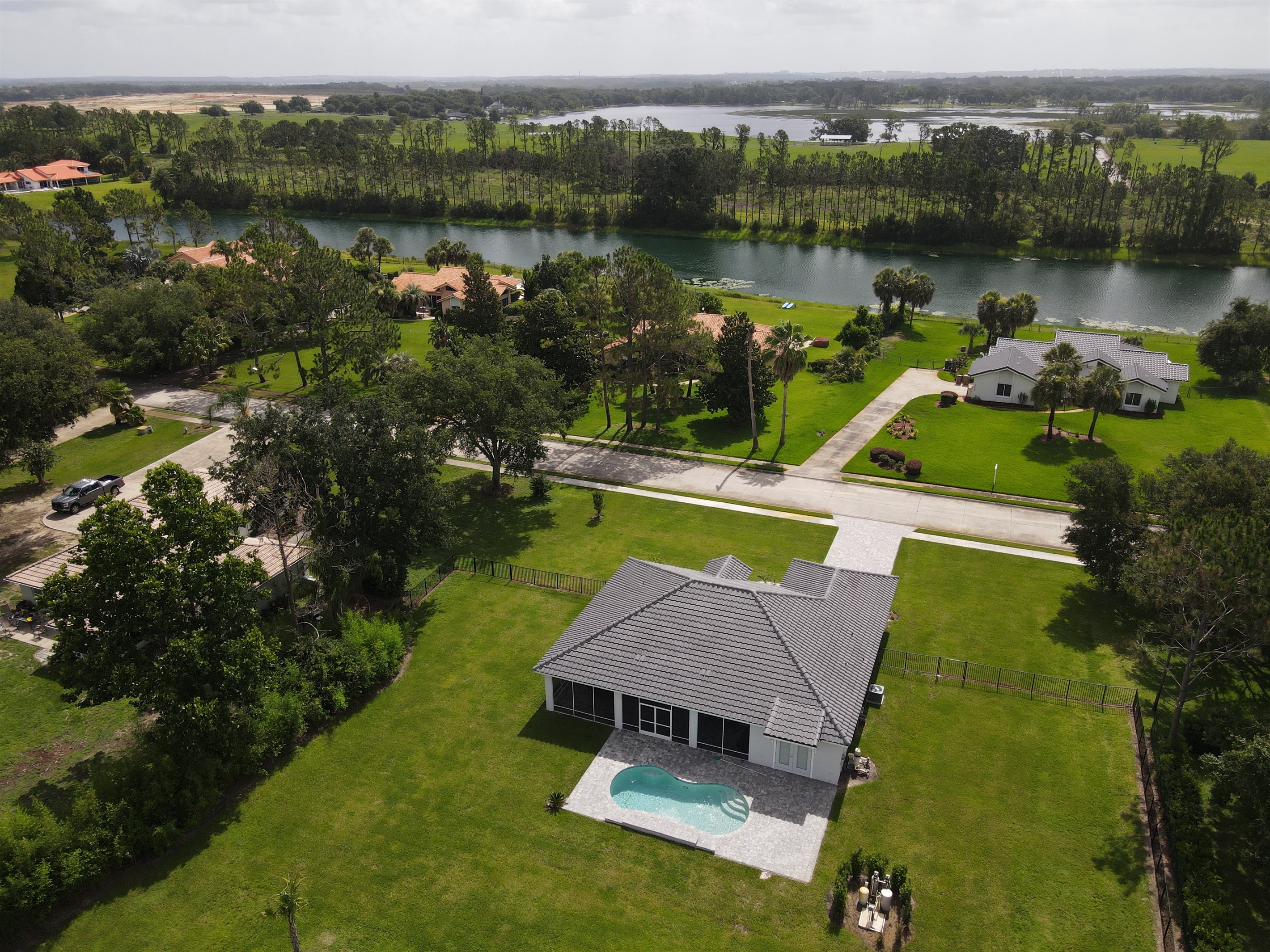 Drone view from backyard and Lake Denise (private ski lake).