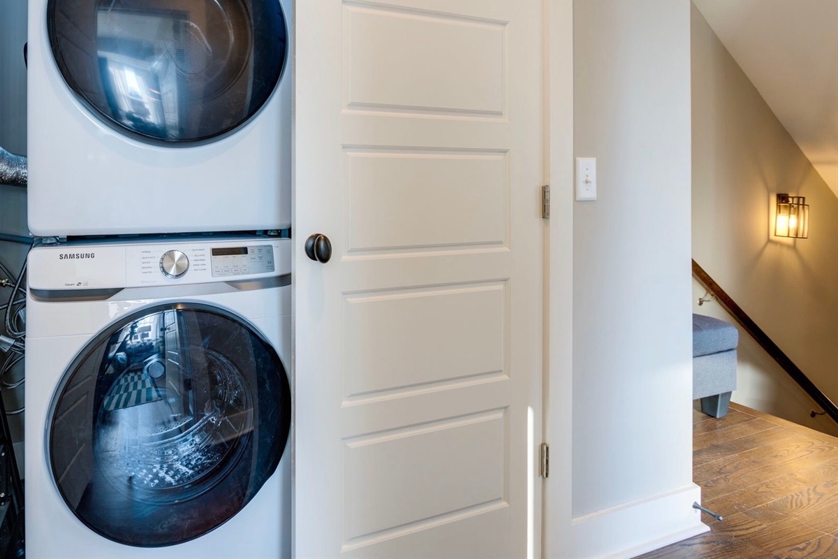 - Stay fresh on your getaway with in unit laundry just steps from the action - Full size washer and dryer make it easy to pack light and travel smart - Tucked neatly behind a hallway door, convenience without the clutter