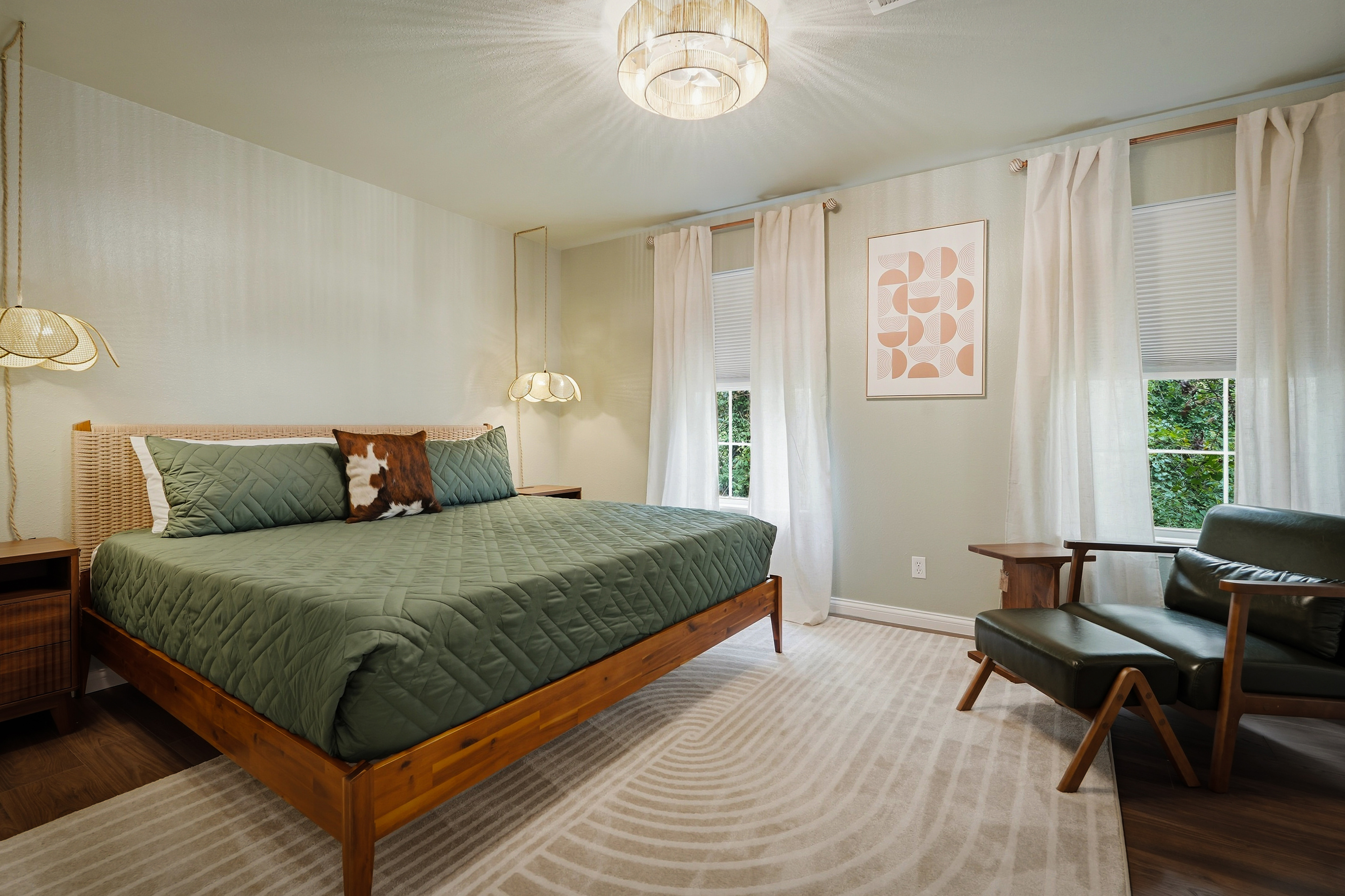 King bedroom with wooded views