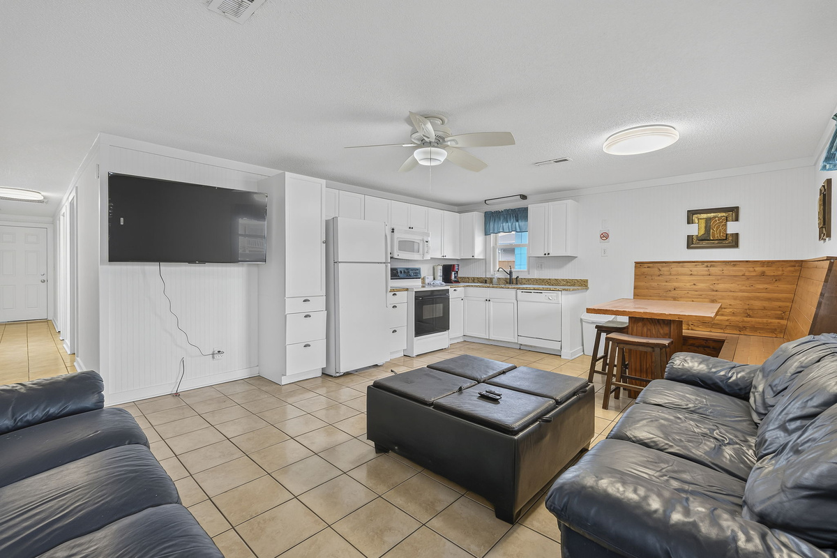 Full Kitchen with Dining Room table that seats 8 and Smart TV