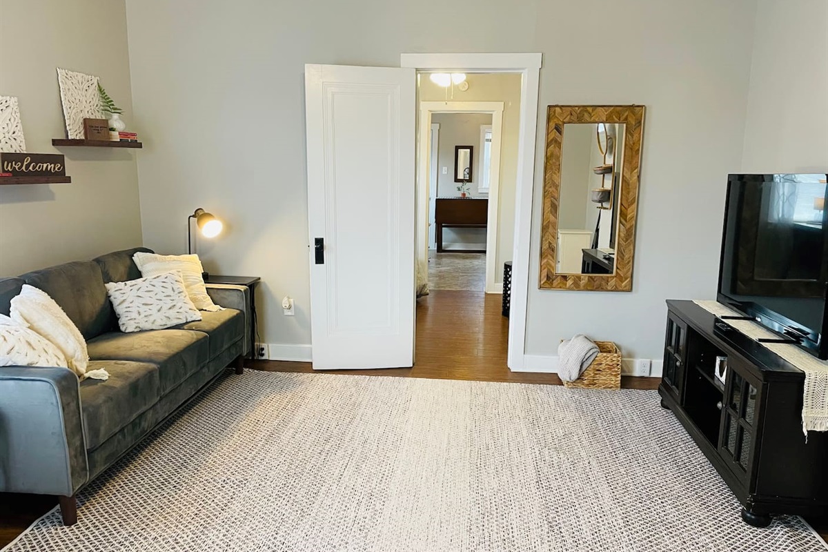 Living room has 50" TV with Amazon Firestick -- log in to your favorite apps and enjoy!