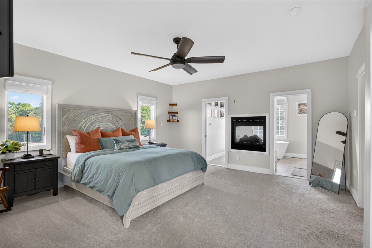 Primary suite with California king bed and luxury finishes