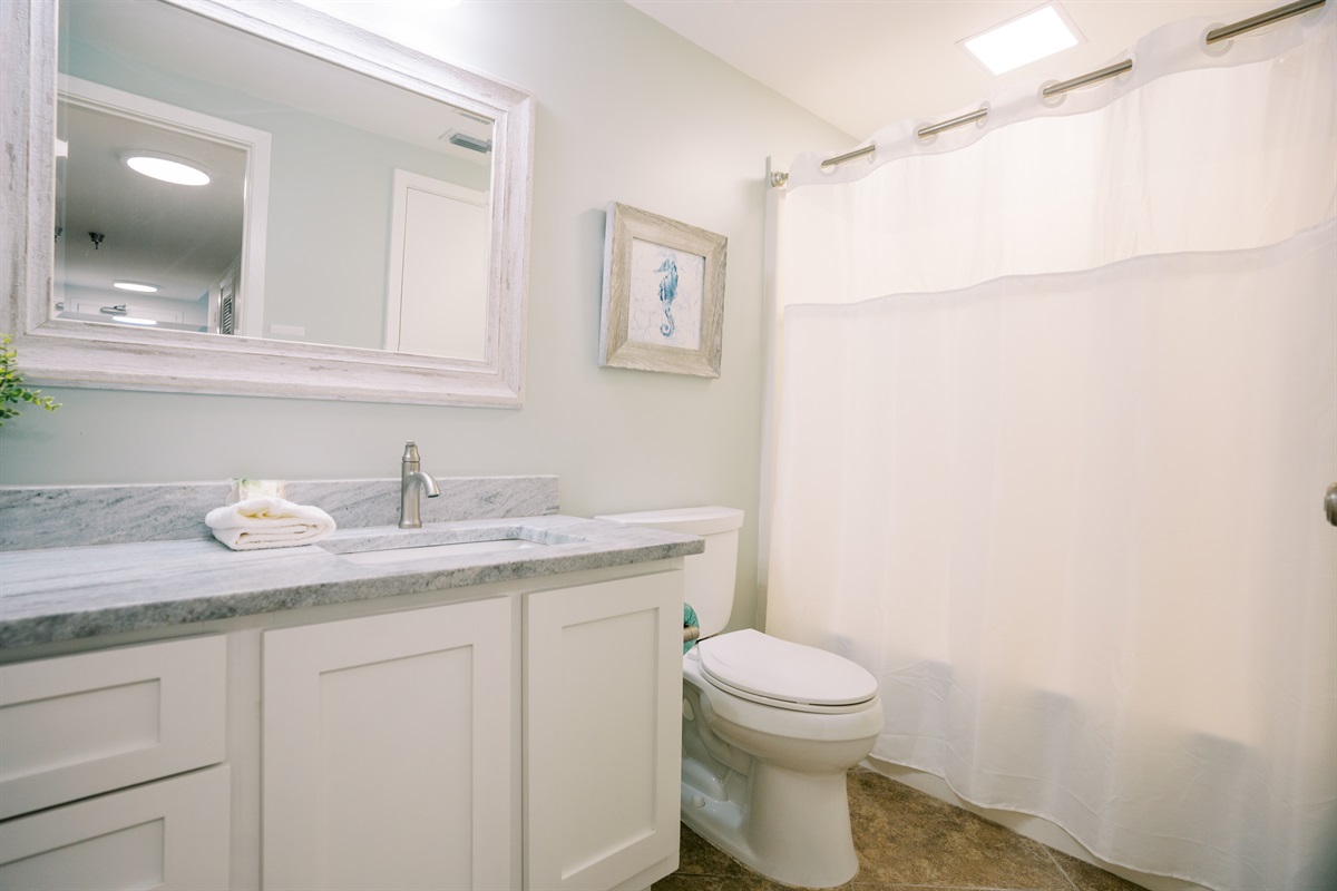 Second full bathroom with tub/shower combo, so no one has to wait to get ready.