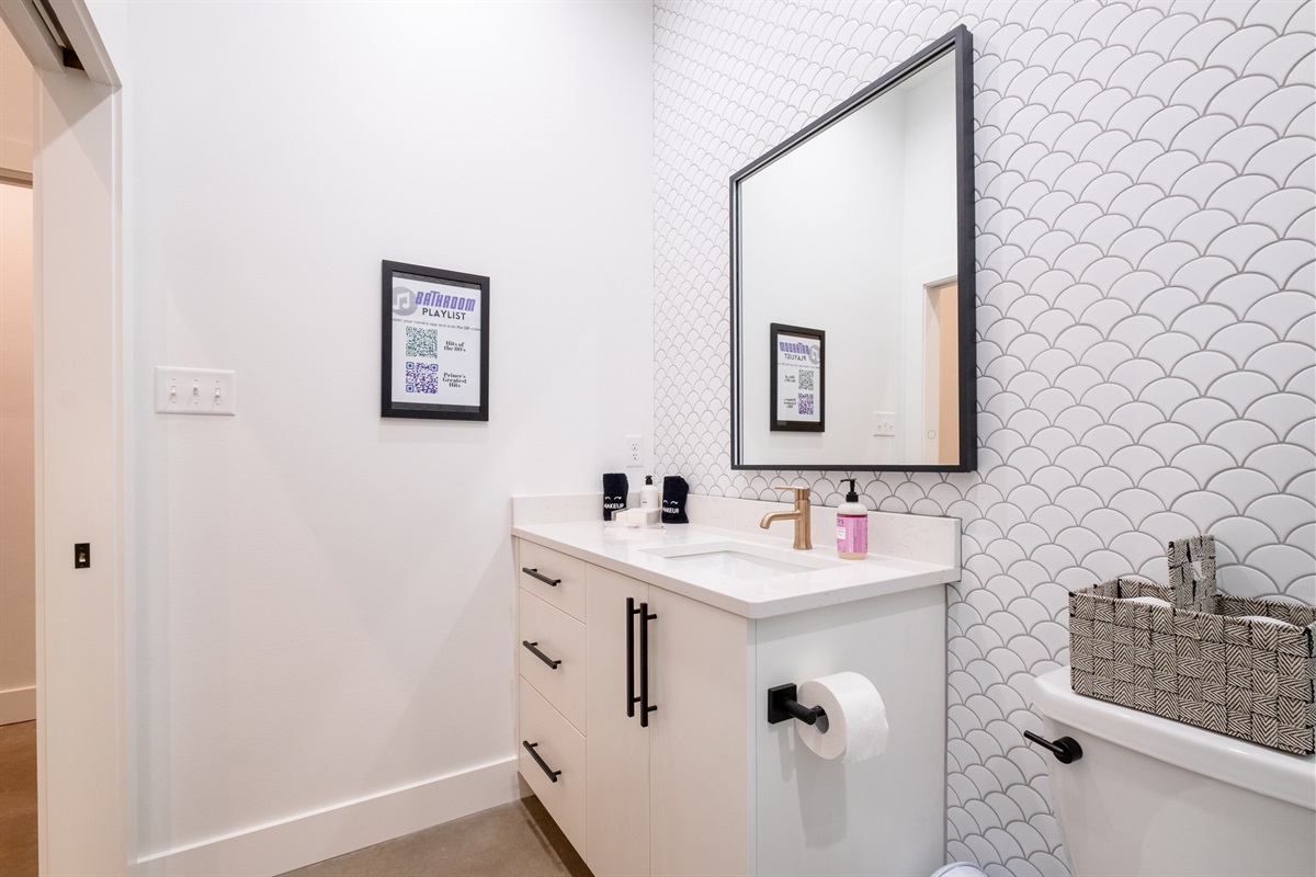 Pristine White bathroom! Step into a space that exudes cleanliness and sophistication. The color scheme creates a fresh and timeless atmosphere, perfect for a relaxing and rejuvenating experience.