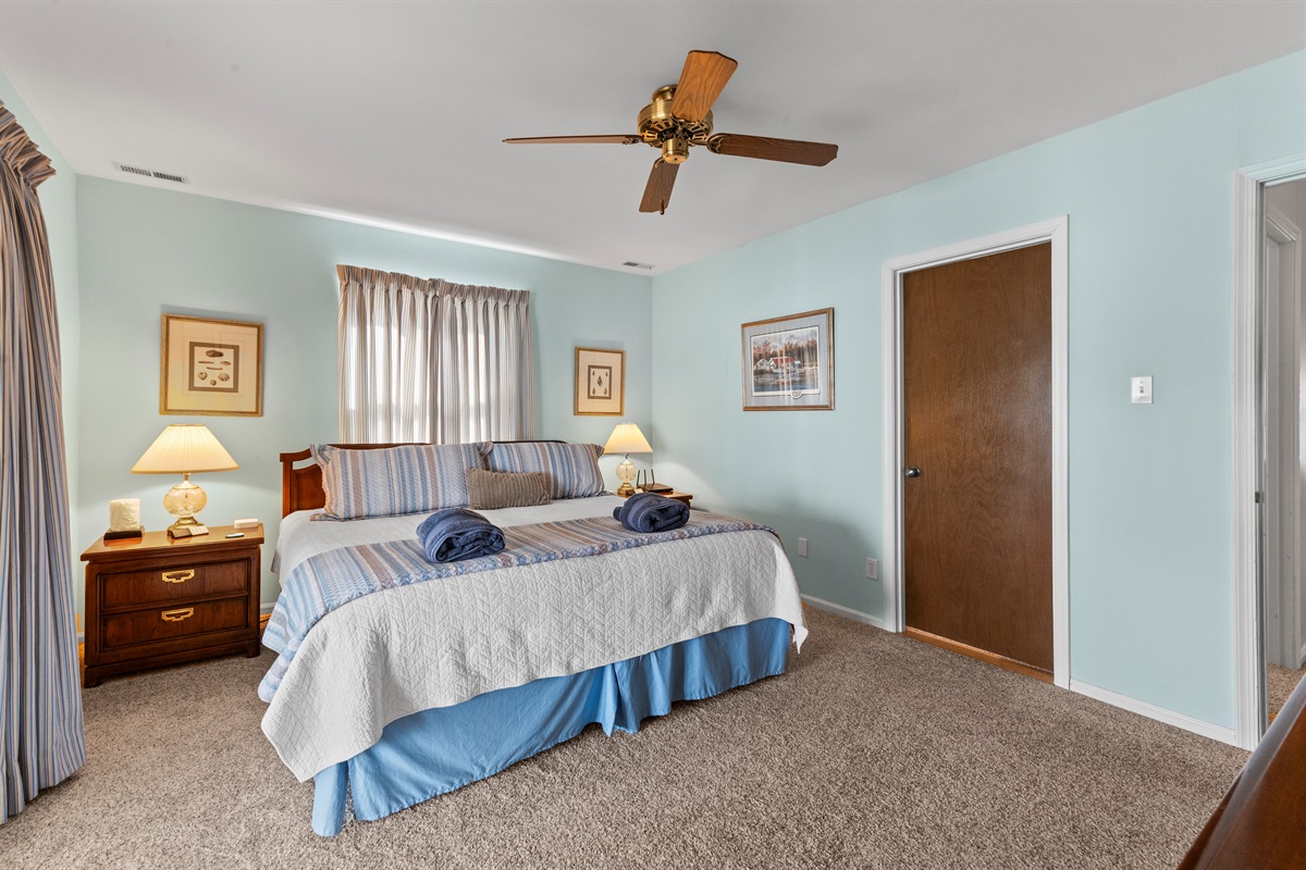 Master Bedroom King: Relax in style with light-filled spaces and plush linens inviting sweet dreams!