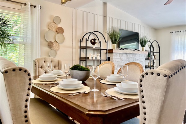 Dining area with seating beside the living room