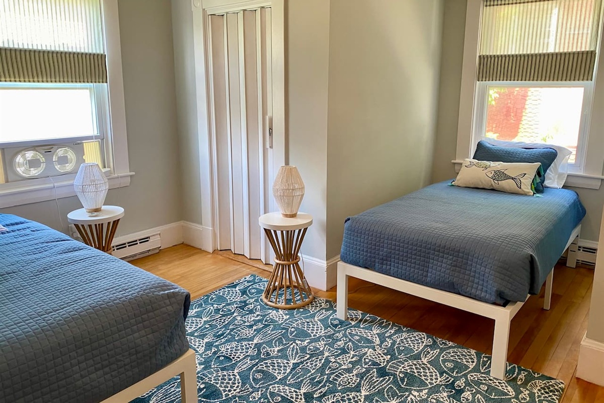 Second bedroom with two twins and closet space