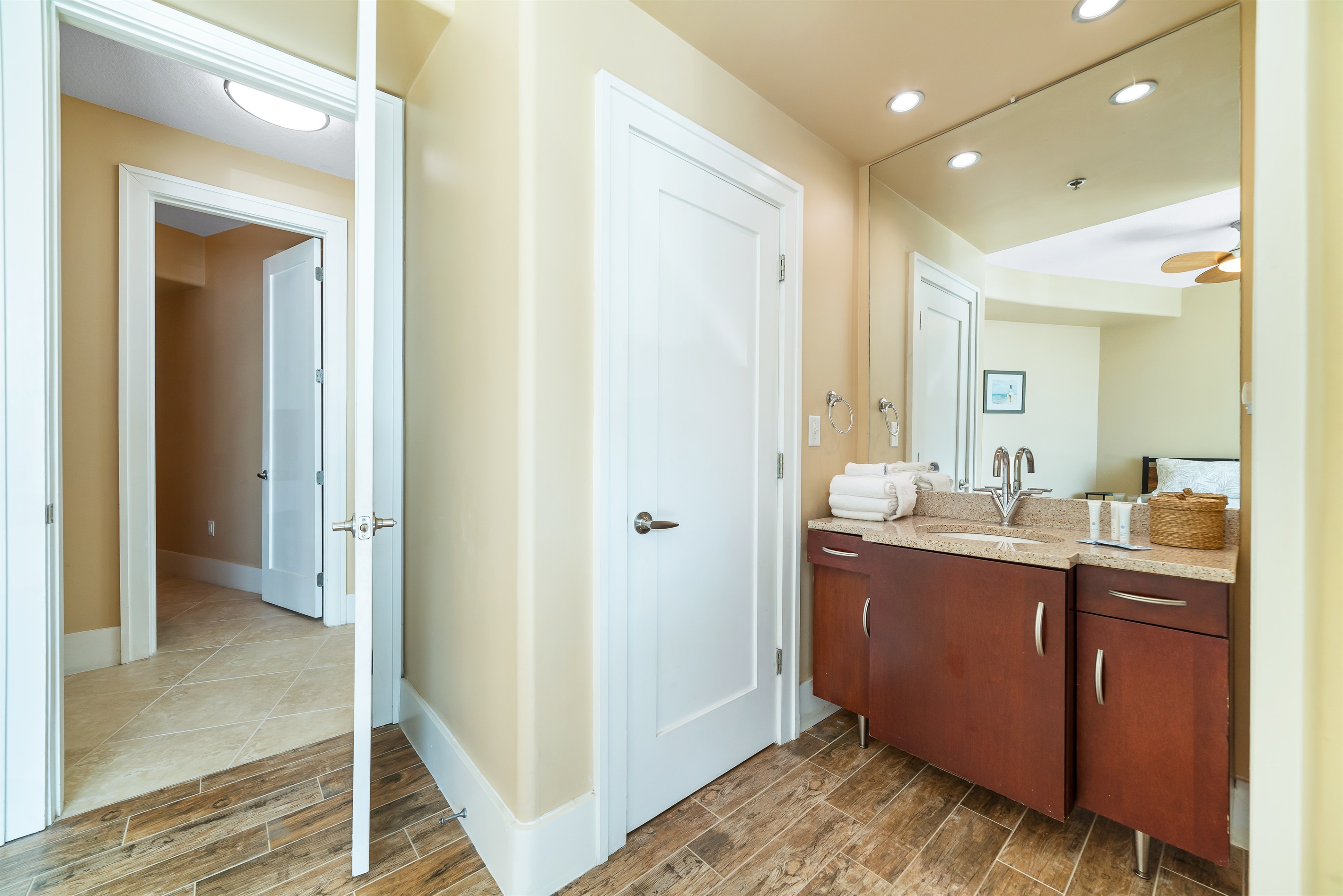 Modern updates meet classic comfort in this bathroom.  Clean lines and thoughtful design provide a relaxing experience.