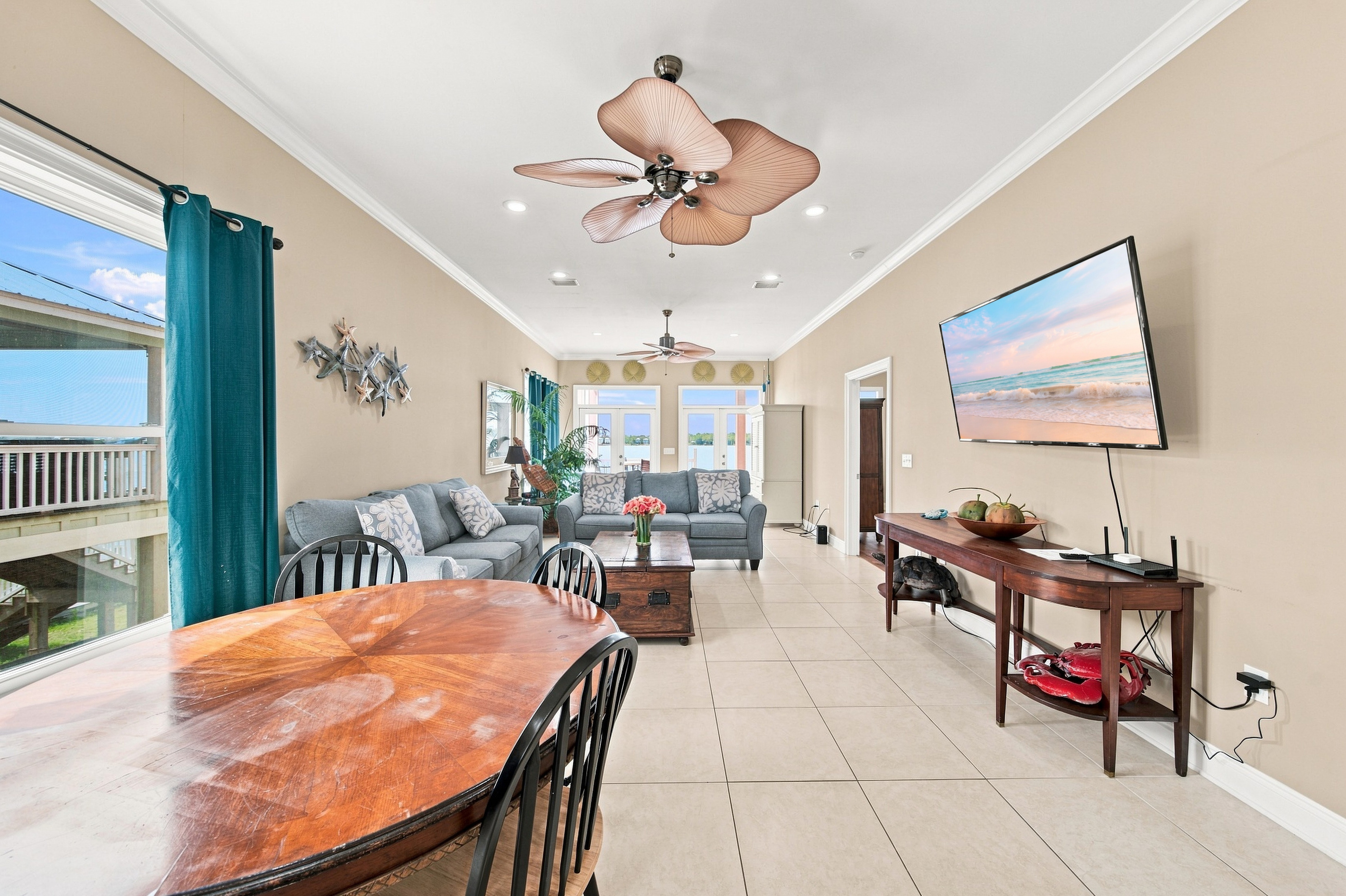 Dining area for the group with bright lagoon-view windows