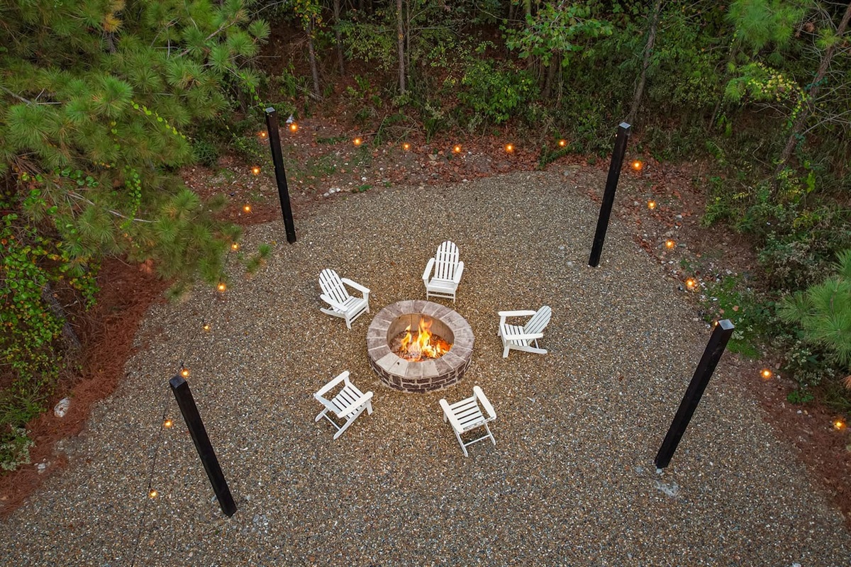 Relax by the fire pit, swing in the hammock, or share stories as the sun goes down—this outdoor space is pure magic.