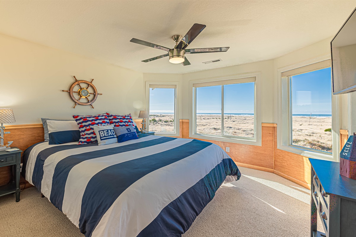 "Captain's Quarter's" bedroom boasts the best view in the house! This bedroom is complete with King size memory foam mattress, 180 degree ocean views & door leading to 3rd floor deck!