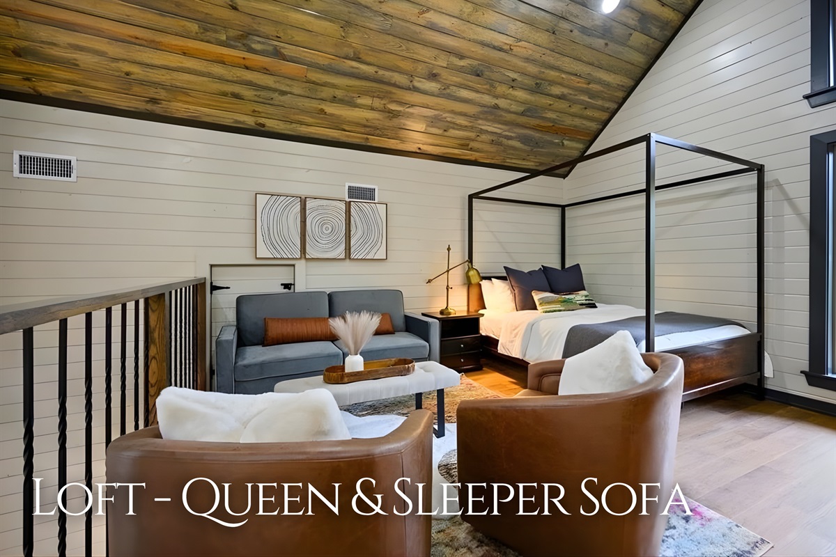 With a queen bed and sleeper sofa, the loft offers flexible sleeping arrangements that are both comfortable and inviting.
