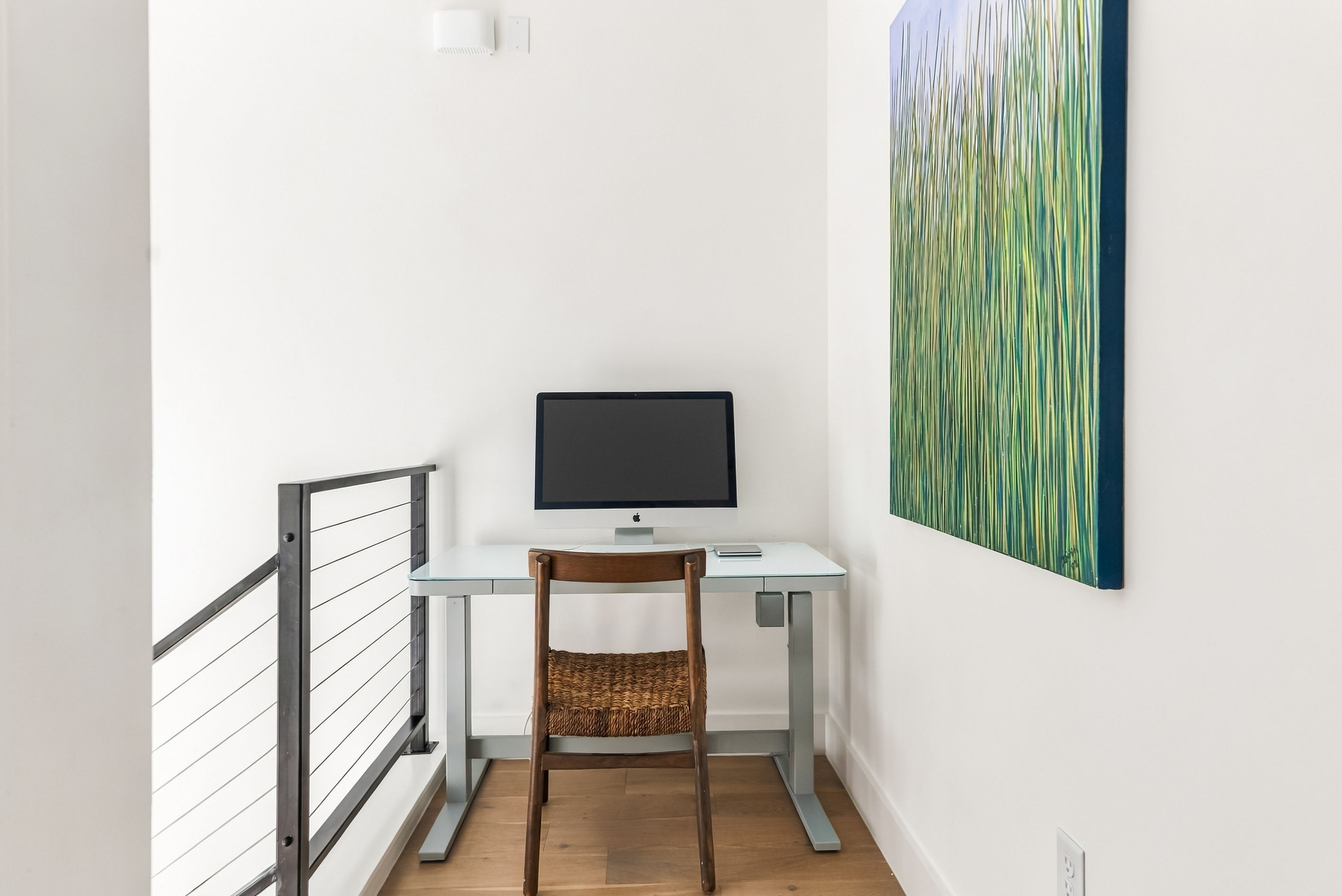 Dedicated workspace with a desk and monitor — ideal for remote work stays.
