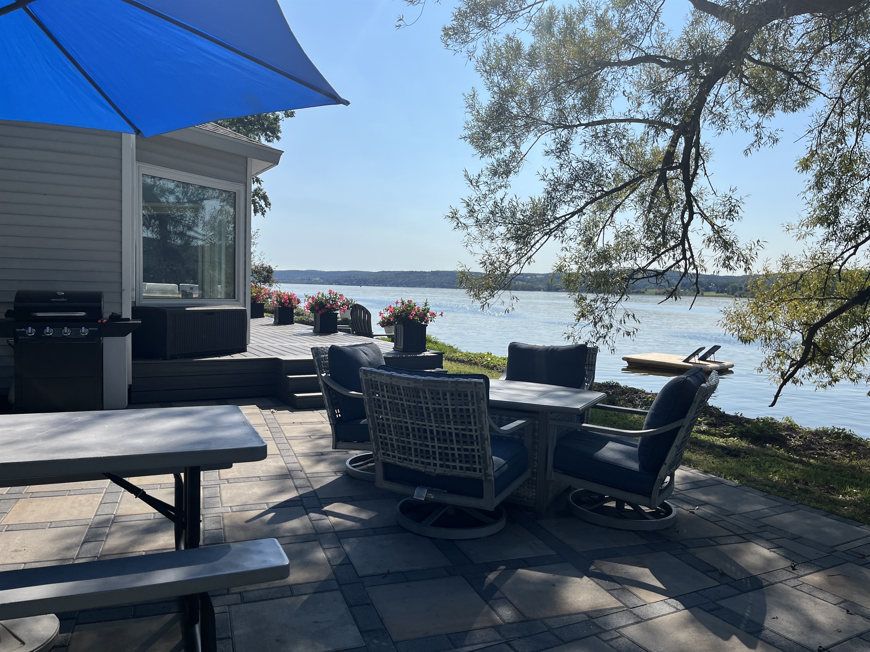 Patio for outdoor dining overlooking the water