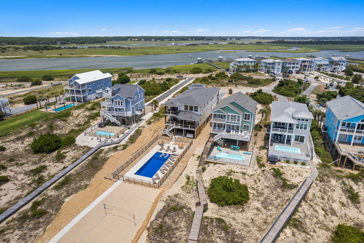 Enjoy 360 degree water views from OKI's newest luxury oceanfront vacation home! Where tranquility meets convenience, The Point is renowned for its privacy on the West End of Oak Island, public beach access, local fishing and breathtaking sunsets.