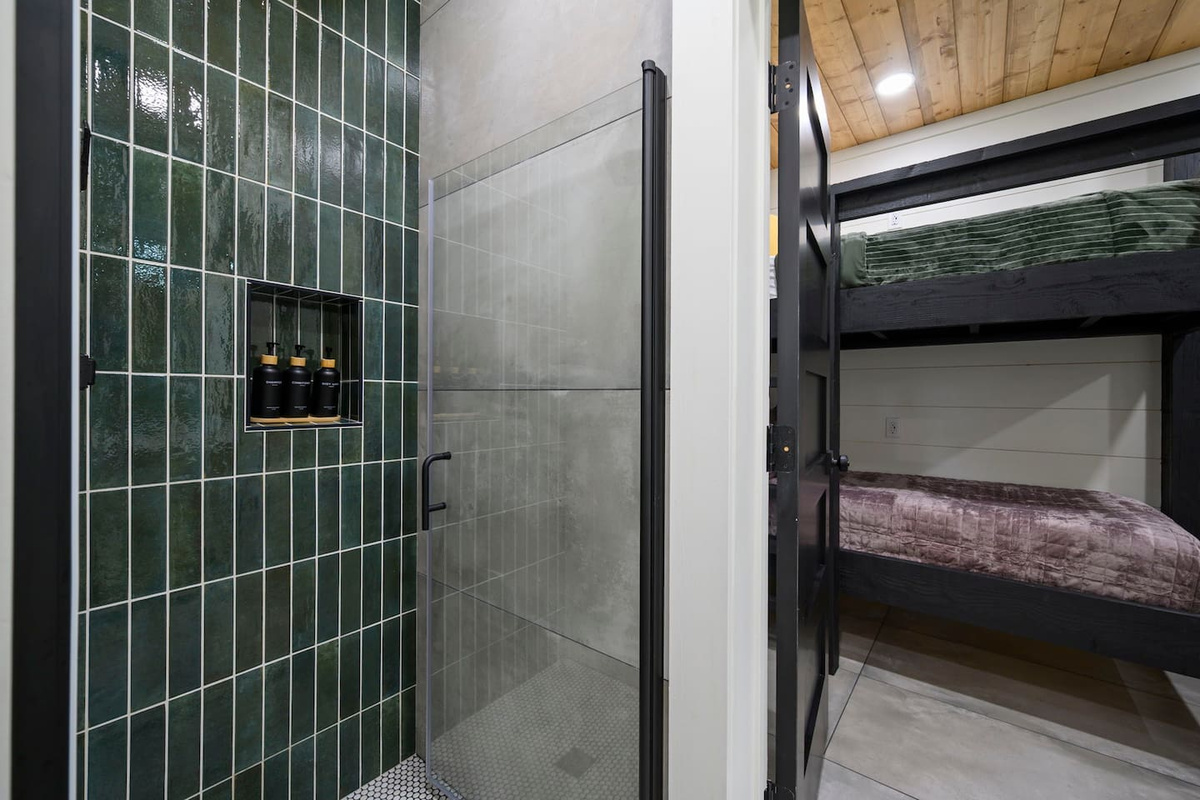 Private bunk-room bathroom with a spacious walk-in shower—perfect for kids and guests.