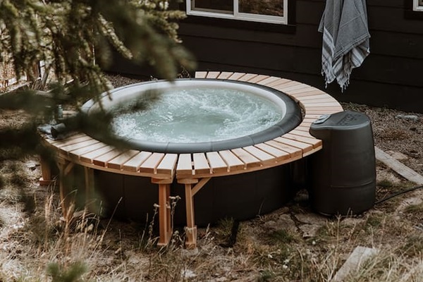 Private hot tub in the back yard 
